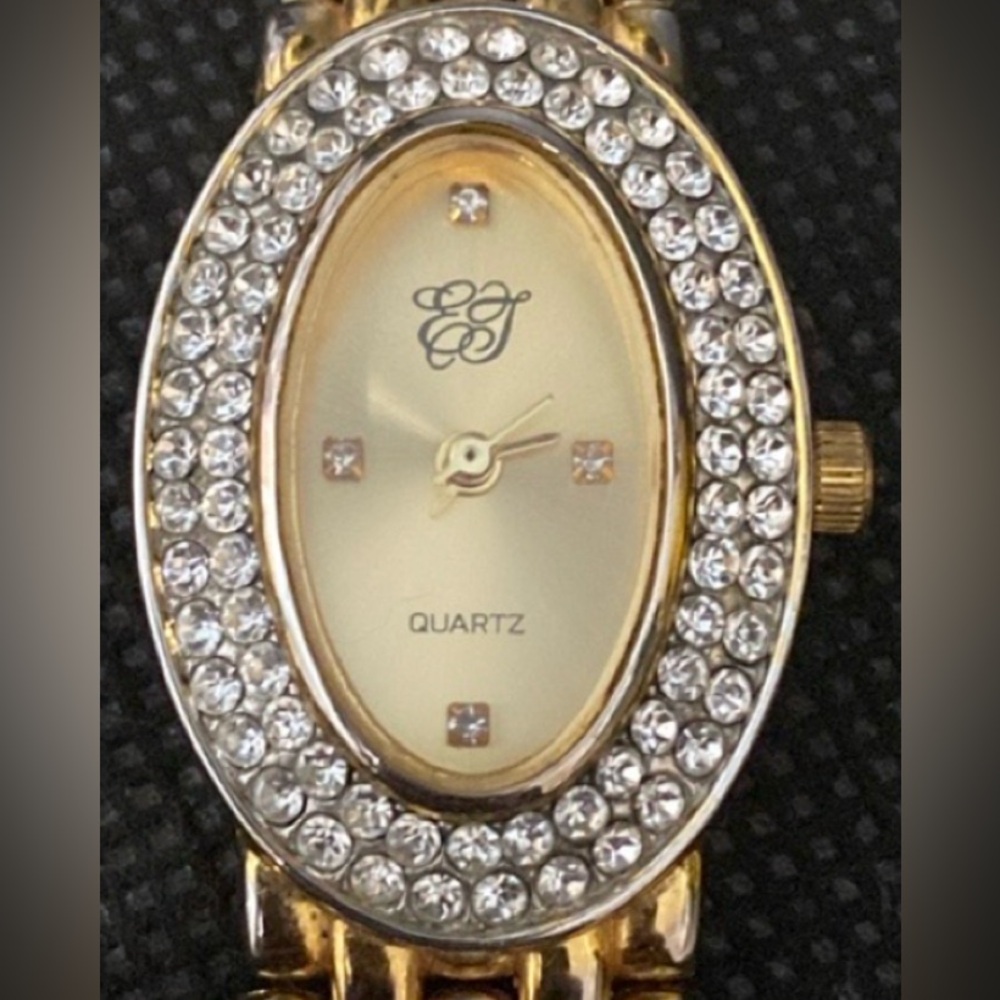 Vintage EJ Ladies Gold Toned Watch with Oval Rhinestones Face